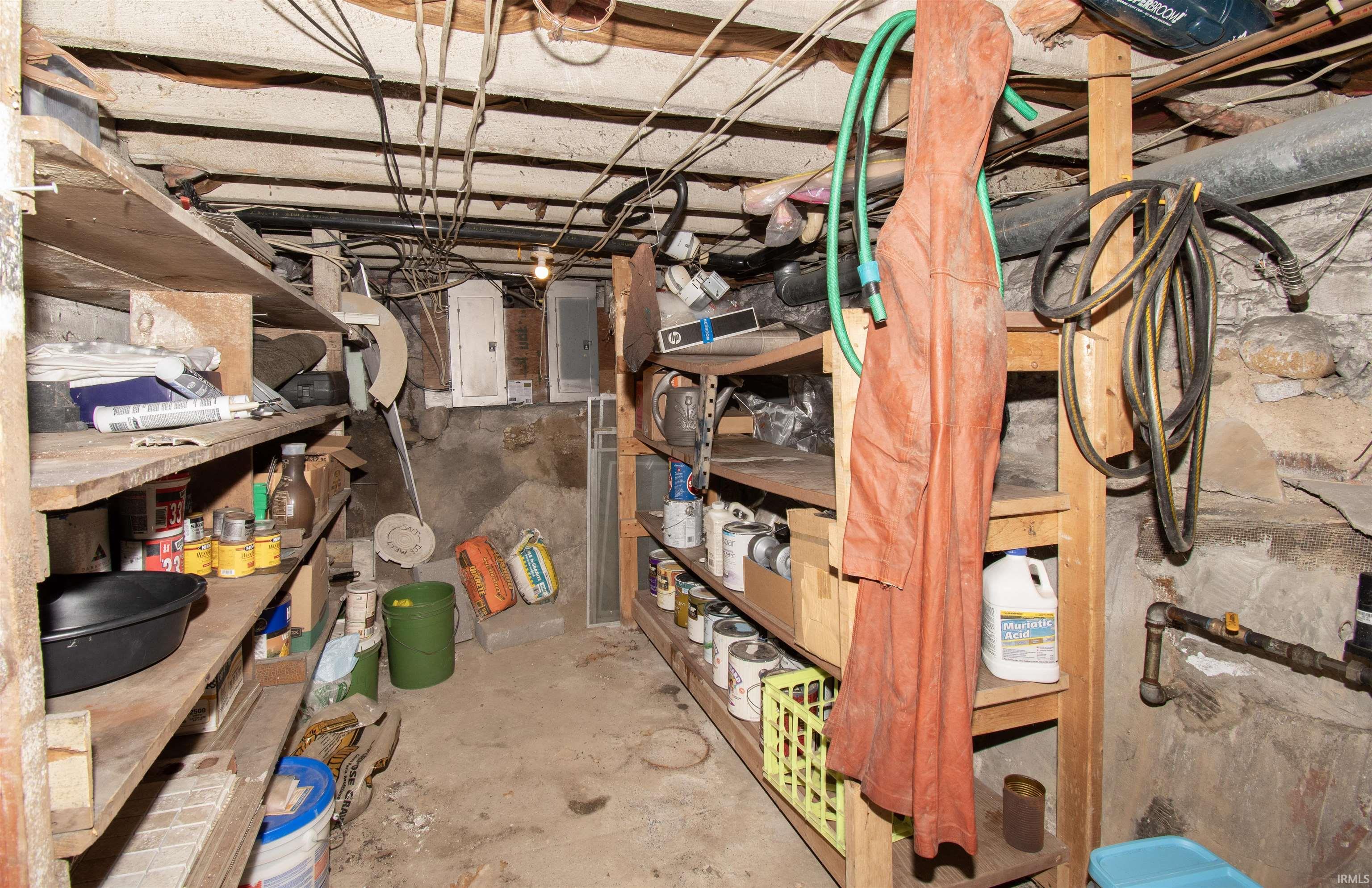 Storage area featuring electric panel