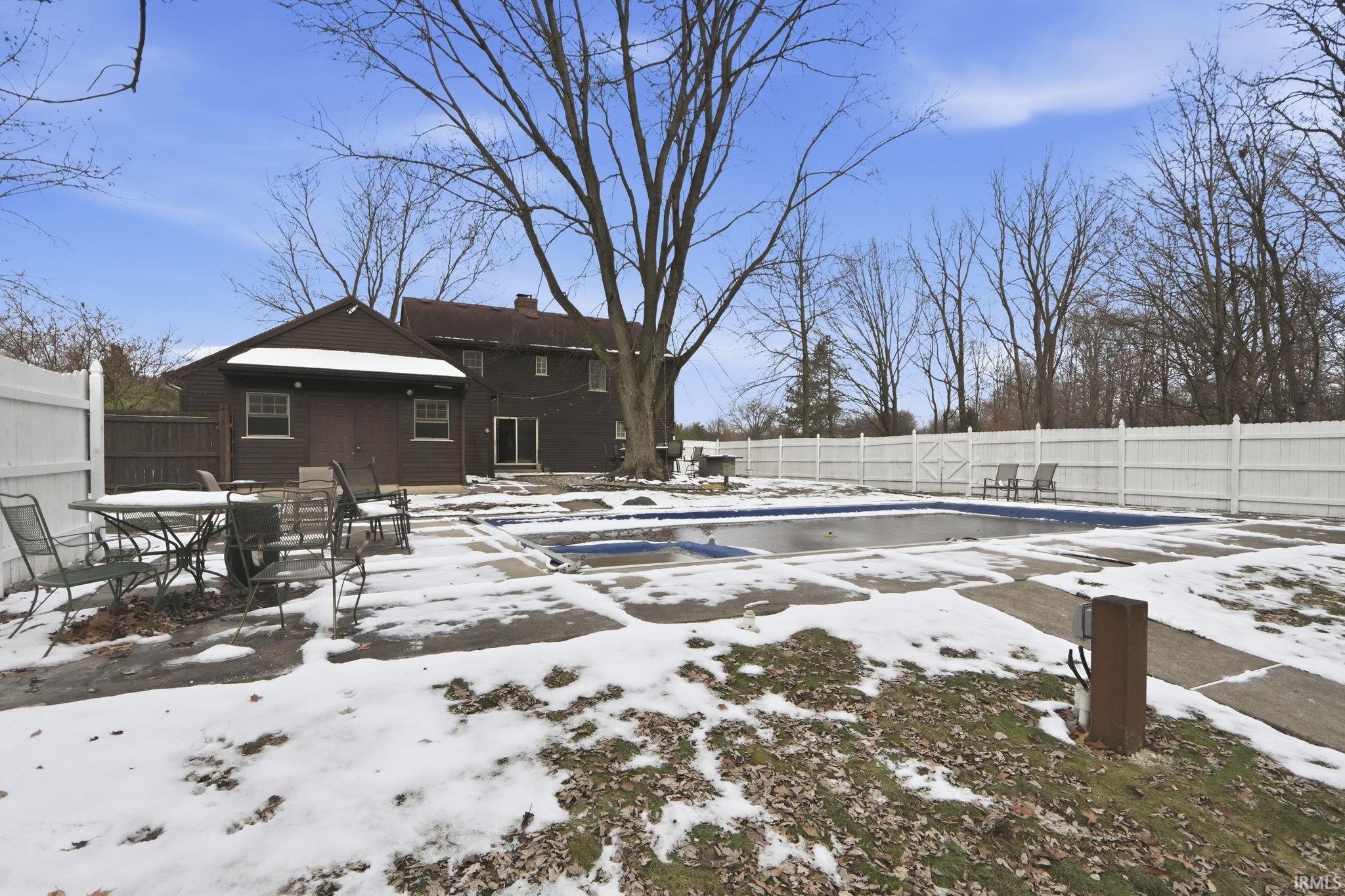 View of pool featuring a fenced backyard, a patio, and outdoor dining area