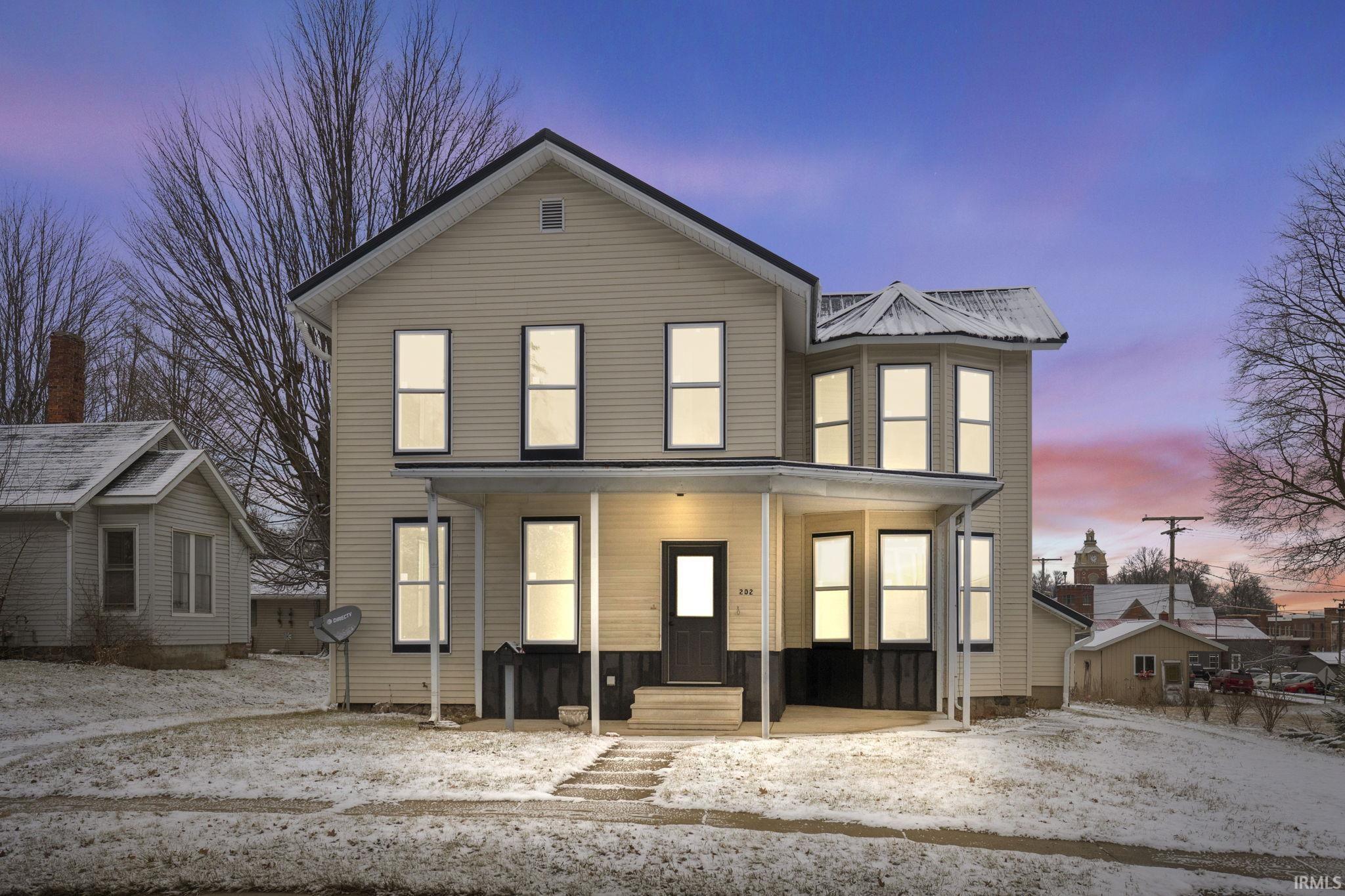 View of front of home featuring a porch