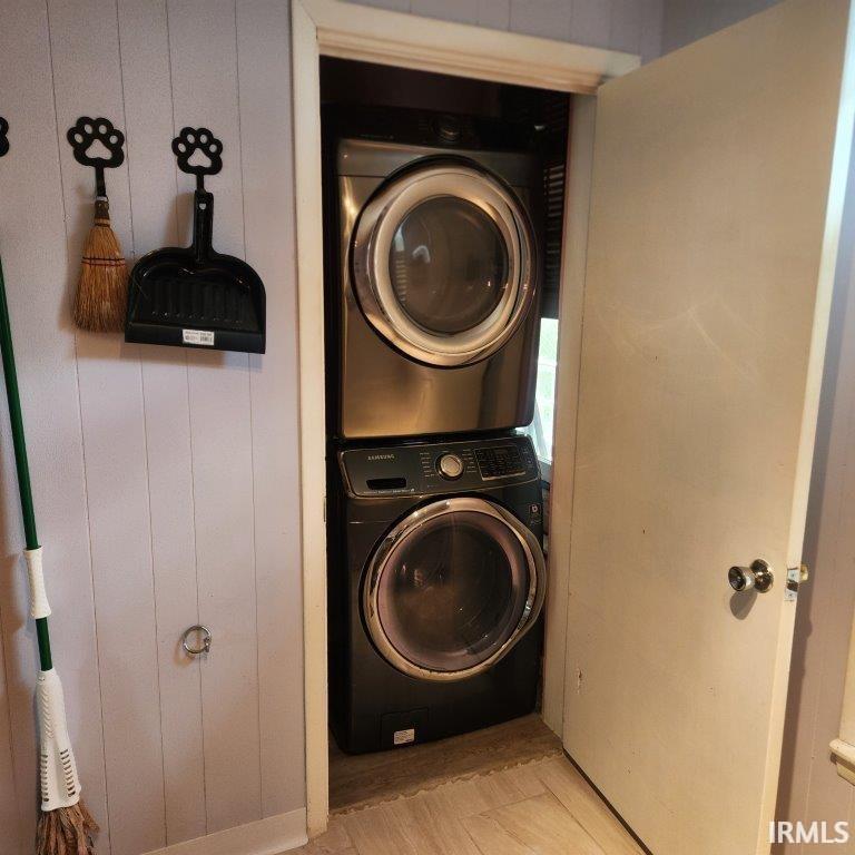Laundry room with estacked washer and dryer