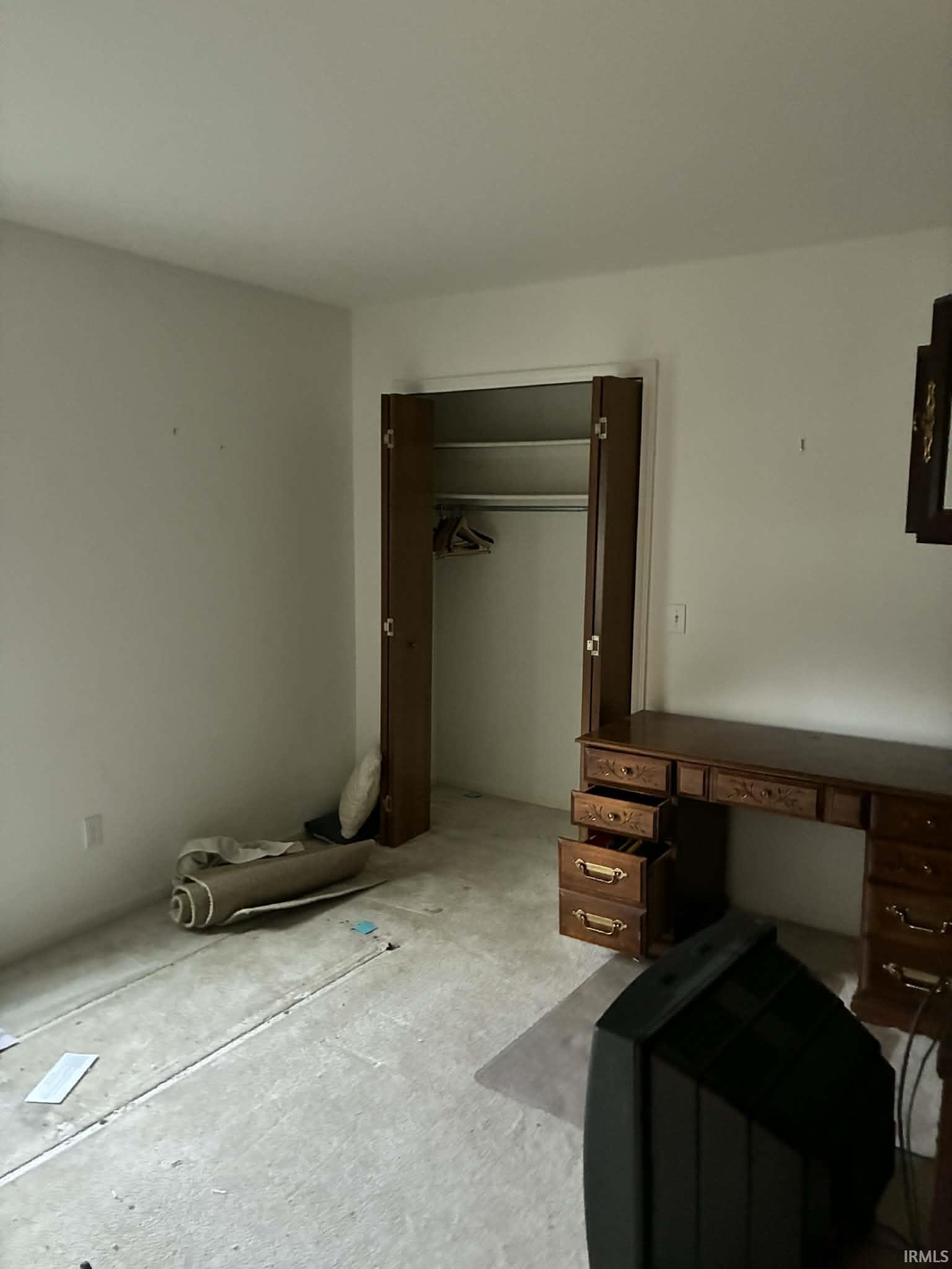 Unfurnished bedroom featuring a closet