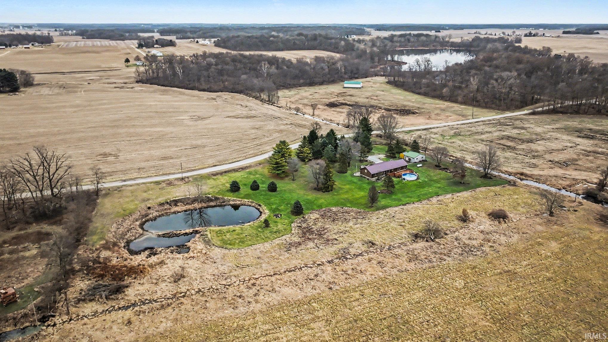 View of property location featuring a large body of water and rural landscape