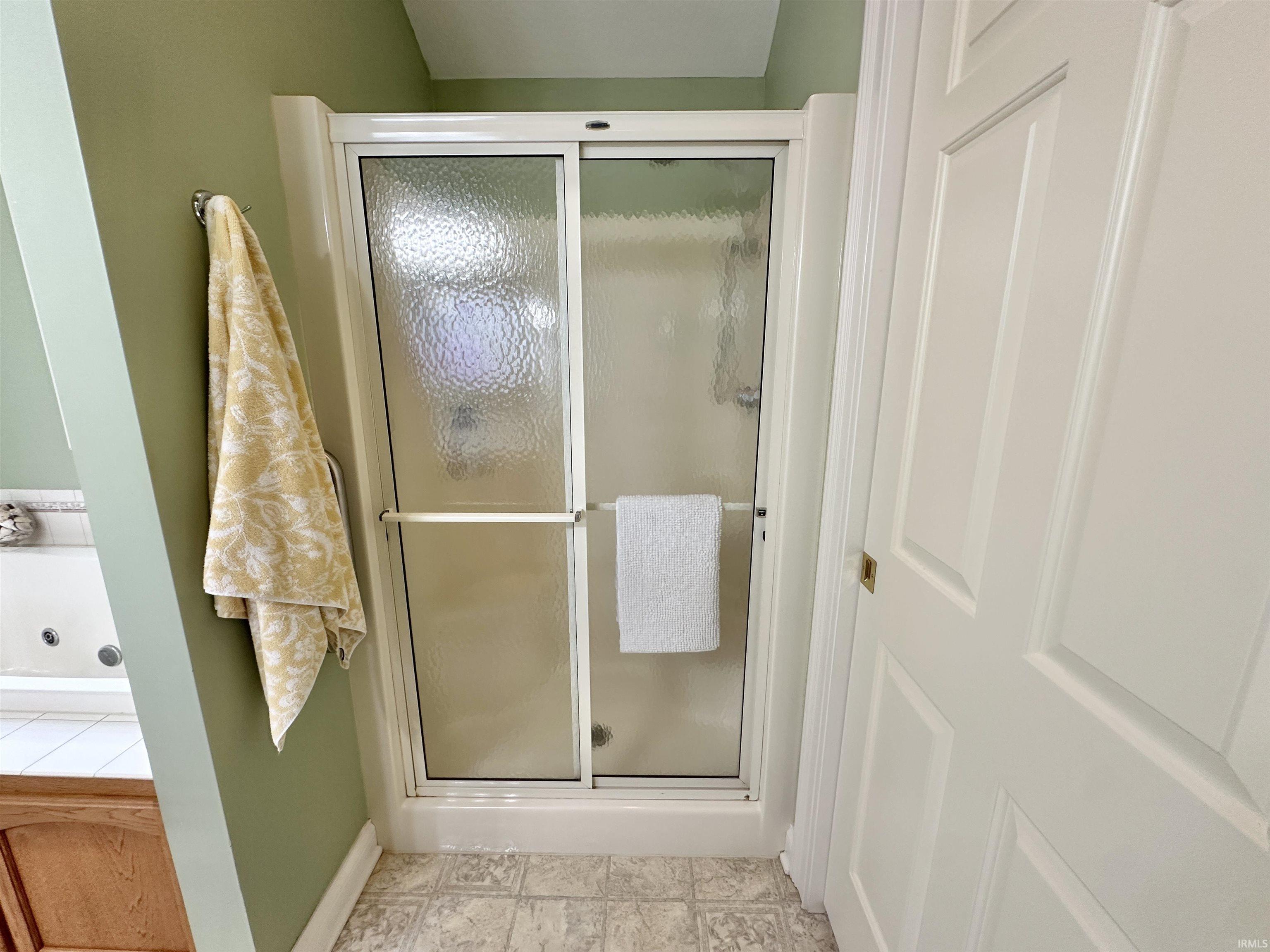 Bathroom featuring a stall shower