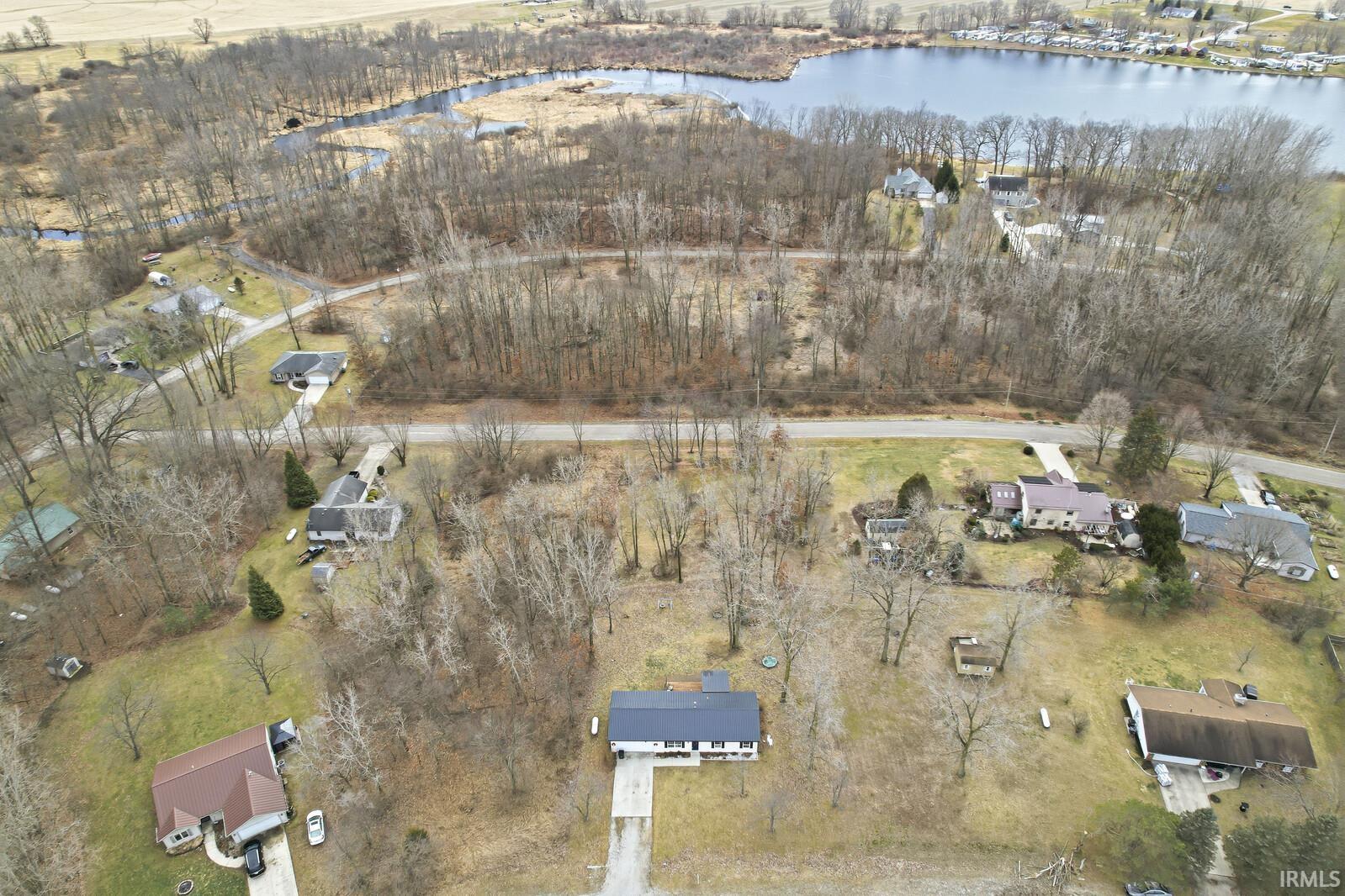 View of property location with a nearby body of water