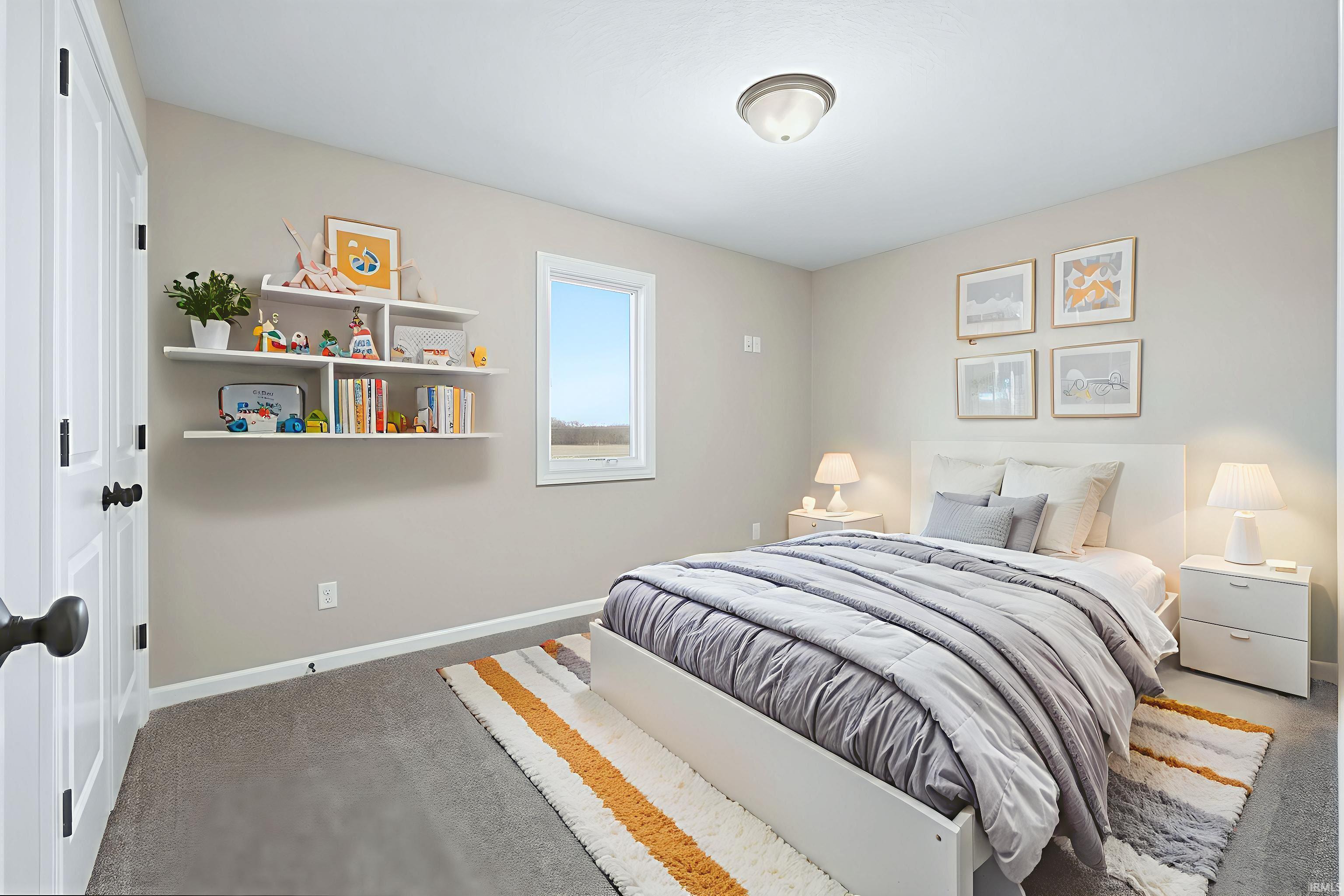 Carpeted bedroom with baseboards