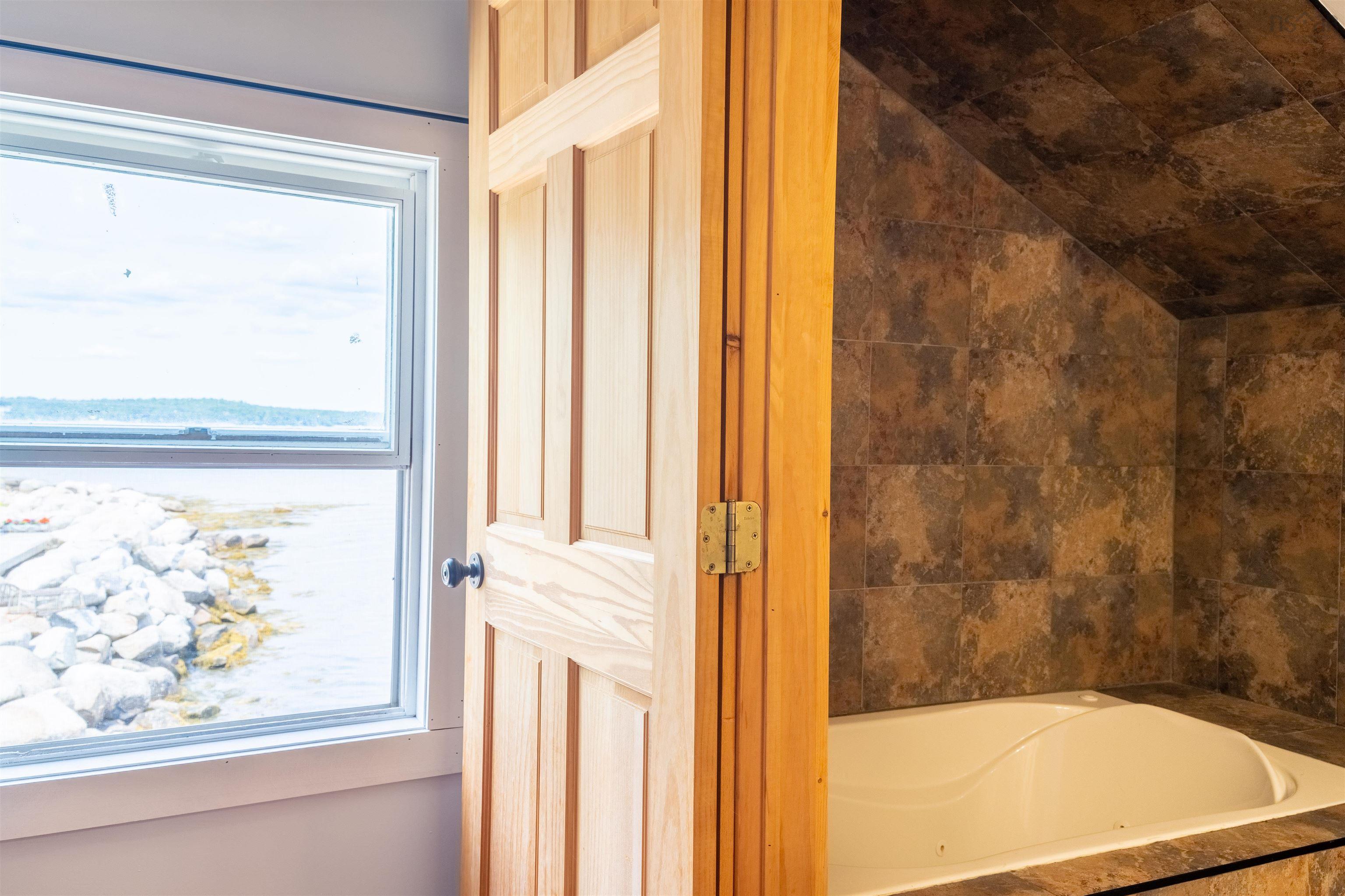 $989,900.00: 501 Mill Cove Shore Rd, Birchy Head