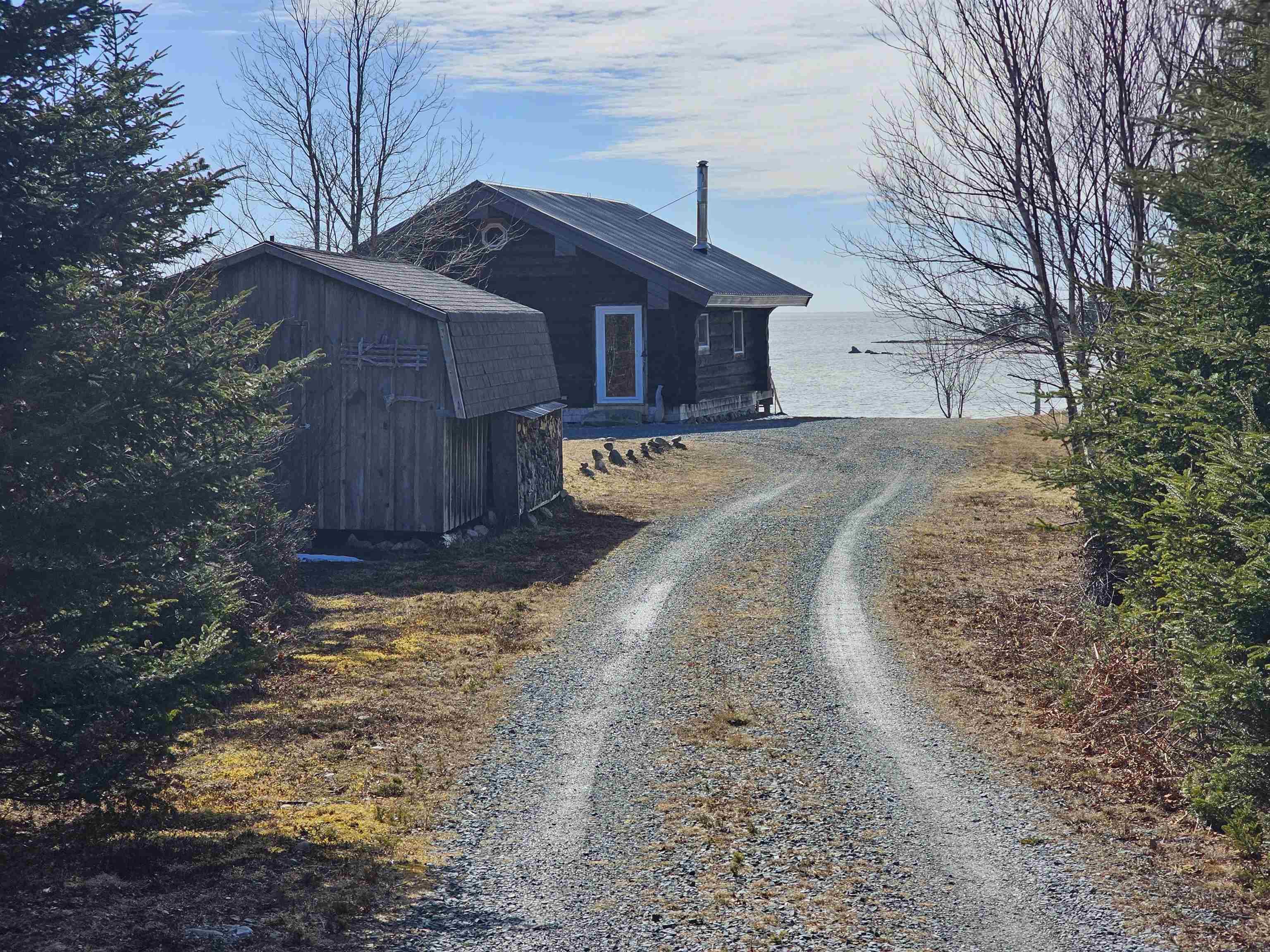 $450,000.00: 2576 East Sable Road, East Sable River