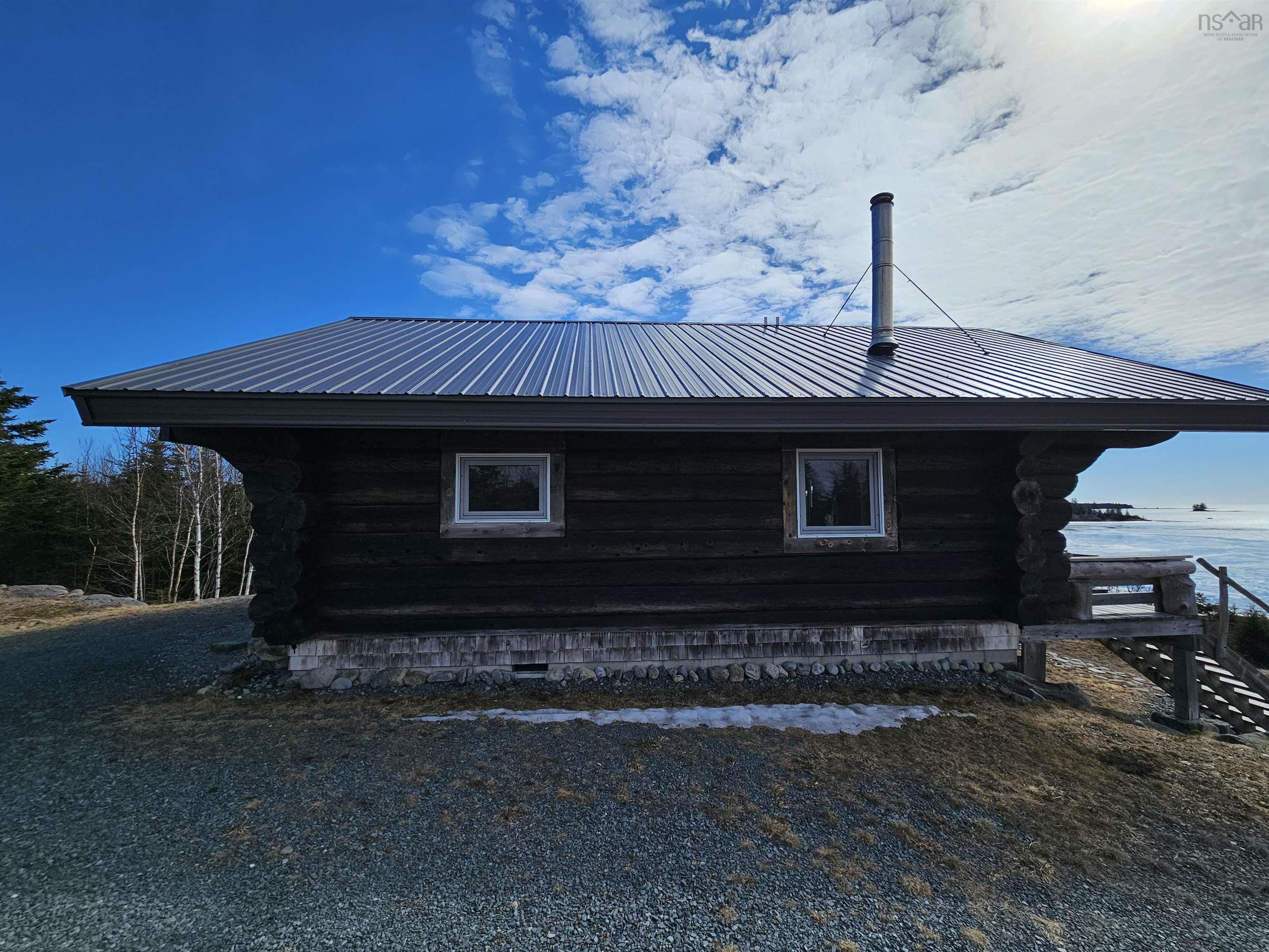 $450,000.00: 2576 East Sable Road, East Sable River