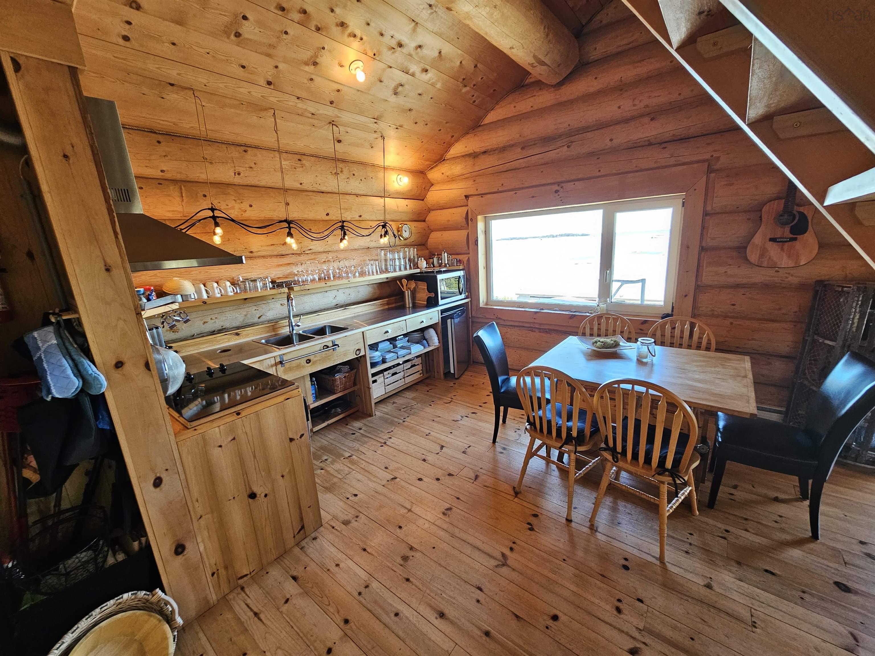 $450,000.00: 2576 East Sable Road, East Sable River